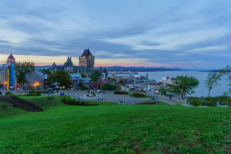 Sunset view of the old town and the Saint Lawrence River from the citadel, Quebec City, Quebec, Canadaの写真素材