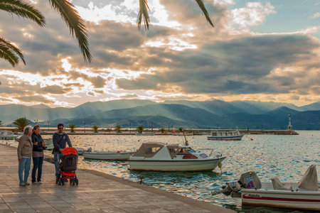 Nafplio, Greece - October 17, 2011: Scene of the harbor, with visitors and Boats in Nafplio, Peloponnese, Greeceのeditorial素材