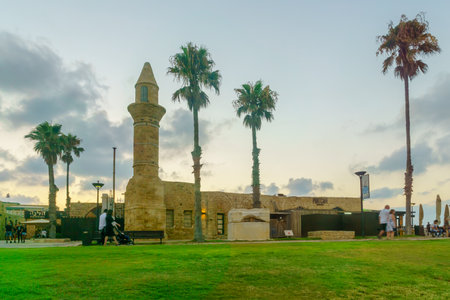 Caesarea, Israel - July 22, 2019: Sunset view of the Bosnian mosque, with visitors, in Caesarea National Park, Northern Israelのeditorial素材
