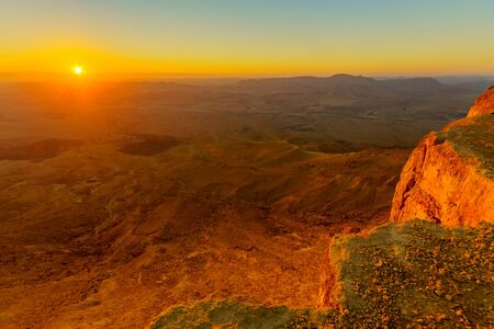 Sunrise view of Makhtesh (crater) Ramon, in the Negev Desert, Southern Israel. It is a geological landform of a large erosion cirqueの写真素材