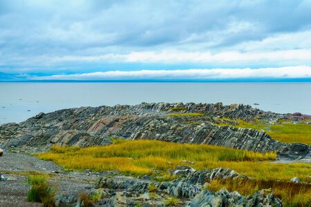 Foggy view of the Saint Lawrence River in Saint-Roch-des-Aulnaies, Quebec, Canada