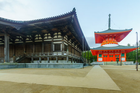 Koyasan, Japan - October 7, 2019: View of the Danjo Garan Sacred Temple Complex, with the Miedo (portrait hall), and Konpon Daito (Great pagoda), in Mount Koya (Koyasan), Japanのeditorial素材