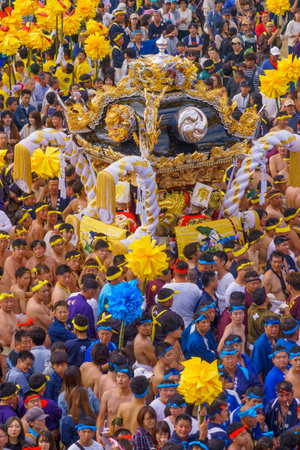 Himeji, Japan - October 14, 2019: Portable shrine carried by men in traditional dressing, and crowd. Part of the Nada no Kenka Festival, in Himeji, Japanのeditorial素材