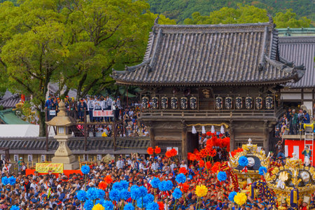 Himeji, Japan - October 14, 2019: Men in traditional dressing, and crowd in front of the Matsubara Hachiman Shrine. Part of the Nada no Kenka Festival, in Himeji, Japanのeditorial素材