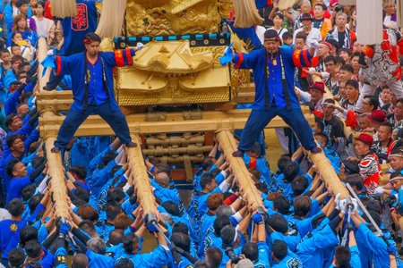 Niihama, Japan - October 17, 2019: Men in traditional clothing lifting a taikodai drum float, as part of the Niihama Taiko Festival, Ehime, Shikoku Island, Japanのeditorial素材