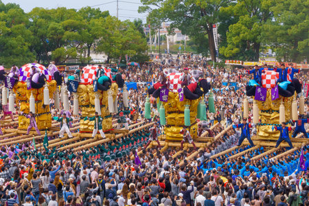 Niihama, Japan - October 17, 2019: Men in traditional clothing lifting a taikodai drum float, as part of the Niihama Taiko Festival, Ehime, Shikoku Island, Japanのeditorial素材