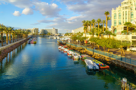 Eilat, Israel - January 17, 2020: View of the marina and hotels, with locals and visitors, in Eilat, southernmost city in Israelのeditorial素材