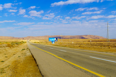 Negev, Israel - January 16, 2020: View of road 40, with a traffic safety sign, in the Negev desert, southern Israelのeditorial素材
