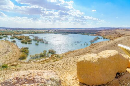Water reservoir and desert landscape near Ein Yahav, the Arava desert, southern Israelの写真素材