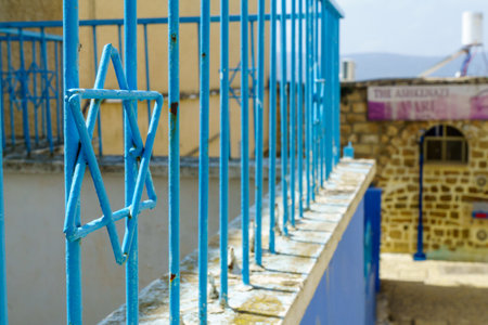 Safed, Israel - March 10, 2020: View of a fence with star of David shape, in an alley in the Jewish Quarter of the old city of Safed (Tzfat), Israelのeditorial素材