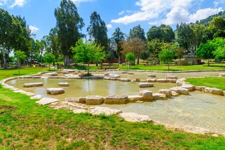 View of a wading pool in Maayan Harod National Park, and the slopes of Mount Gilboa. Northern Israelの写真素材