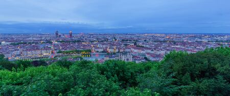 The Saint-Jean cathedral, Saone River and the city center, at evening, in Lyon, France