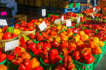 Peppers and other vegtables on sale in the Jean-Talon Market Market, Little Italy district,...