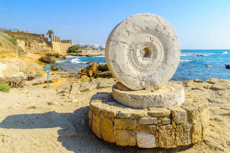 View of an old Millstone on the coast, in Achziv national park, northern Israelの写真素材