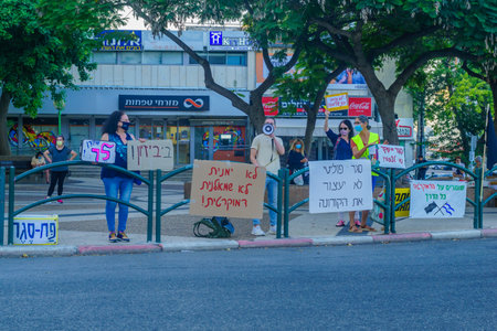 Haifa, Israel - October 06, 2020: People protest within 1km from home, against the government, Bibi...