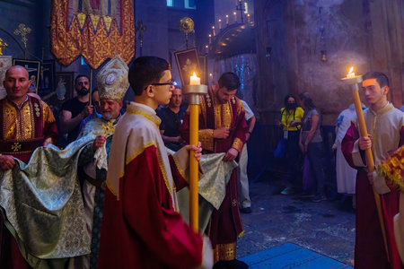 Jerusalem, Israel - May 01, 2021: The party of the Armenian Patriarch of Jerusalem, on Holy Saturday...