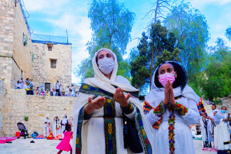 Jerusalem, Israel - May 01, 2021: Members of the Ethiopian Orthodox Tewahedo Church community, on...