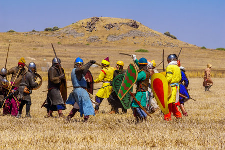 Lavi, Israel - July 02, 2021: Re-enactment of the 1187 Battle of the Horns of Hattin (Ayyubid sultan Saladin defeated the crusaders): Infantry fight. Horns of Hattin, Israelのeditorial素材