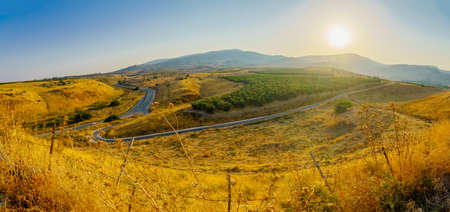 Panoramic twilight view of countryside and the Galilee mountains landscape in the Hula Valley, view from Tel Hazor, Northern Israelの写真素材
