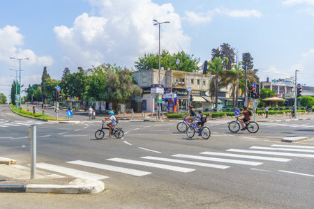 Haifa, Israel - September 16, 2021: Scene of Yom Kippur Holiday, with streets free from driving cars, and filled with cyclist. Haifa, Israelのeditorial素材