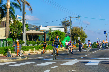 Haifa, Israel - September 16, 2021: Scene of Yom Kippur Holiday, with streets free from moving cars, and filled with cyclists. Haifa, Israelのeditorial素材