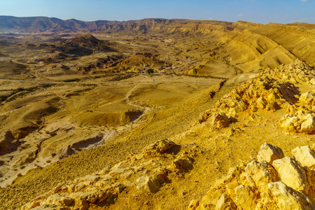 View of HaMakhtesh HaGadol (the big crater, Yeruham Crater), in the Negev Desert, Southern Israel. It is a geological landform of a large erosion cirqueの写真素材