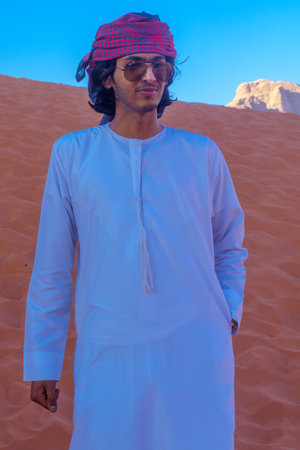 Wadi Rum, Jordan - October 21, 2021: Portrait of a young Bedouin man, in Wadi Rum, desert park in Southern Jordanのeditorial素材