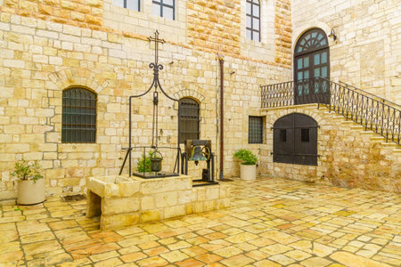 Jerusalem, Israel - November 20, 2021: View of a water well, in the yard of the Monastery of Saint Saviour (San Salvador), in the Old City of Jerusalem, Israel. Text: Holy Landのeditorial素材