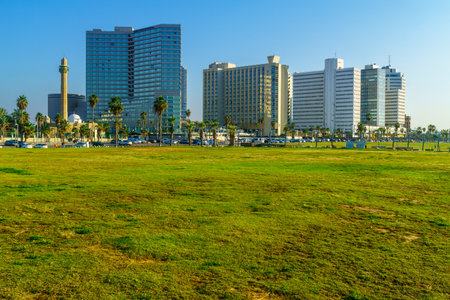 Tel-Aviv, Israel - November 23, 2021: Scene of the Charles Clore Park, with hotels buildings, Hassan Bek Mosque, locals and visitors. Now Tel-Aviv-Yafo, Israelのeditorial素材