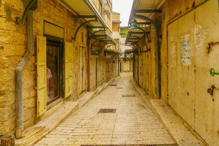 Nazareth, Israel - December 24, 2021: View of an empty alley in the old city market, Nazareth, Israelのeditorial素材