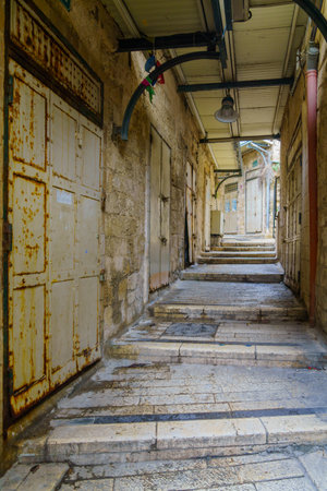 Nazareth, Israel - December 24, 2021: View of an empty alley in the old city market, Nazareth, Israelのeditorial素材