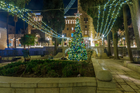 Jerusalem, Israel - December 28, 2021: View of the historic YMCA compound, with Christmas tree and Christmas lights. Jerusalem, Israelのeditorial素材