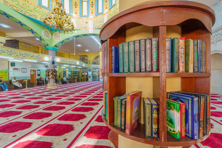 Tayibe, Israel - April 09, 2022: View of the interior Salah al-Din Mosque, with Ramadan prayers, in the ancient center of Tayibe, a Muslim Arab town in central Israelのeditorial素材