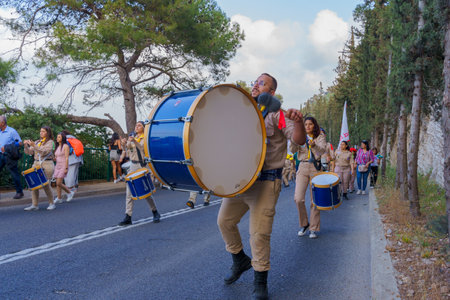 Haifa, Israel - May 01, 2022: Scouts musicians and others in the Our Lady of Mount Carmel parade,...
