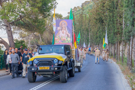 Haifa, Israel - May 01, 2022: Scouts and others take part in the Our Lady of Mount Carmel parade, near Stella Maris, in Haifa, Israel. This annual event commemorates the hiding of Mary statue in WWIのeditorial素材