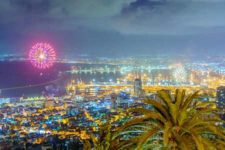 Haifa, Israel - May 04, 2022: View of Independence Day fireworks, with the downtown and the harbor, in Haifa, Northern Israelのeditorial素材