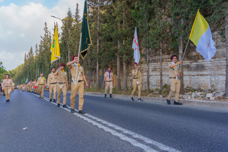 Haifa, Israel - May 01, 2022: Scouts and others take part in the Our Lady of Mount Carmel parade, near Stella Maris, in Haifa, Israel. This annual event commemorates the hiding of Mary statue in WWIのeditorial素材