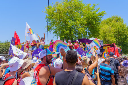 Tel-Aviv, Israel - June 10, 2022: Dancers on a truck entertain the dancing crowd in the annual Pride...