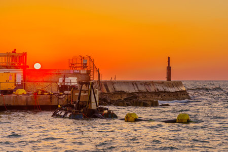 Tel-Aviv, Israel - June 28, 2022: Sunset scene of the port compound, in Tel-Aviv, Israelのeditorial素材