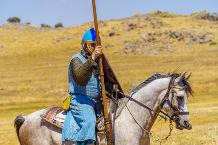 Lavi, Israel - July 01, 2022: Reenactment of the 1187 Battle of the Horns of Hattin (Ayyubid sultan Saladin defeated the crusaders): Crusader knight on a horse. Horns of Hattin, Israelのeditorial素材