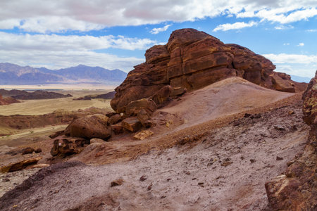 Winter view of Rock formation and the Arava desert valley landscape near the Shkhoret Canyon,...