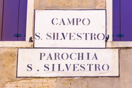 View of a typical street and square name signs, in Venice, Veneto, Northern Italyの写真素材