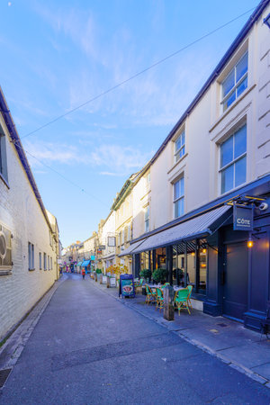 Cirencester, UK - October 17, 2022: Street view with local businesses, locals, and visitors, in Cirencester, the Cotswolds region, England, UKのeditorial素材