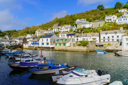 Polperro, UK - October 16, 2022: View of the fishing port of the village Polperro, in Cornwall,...