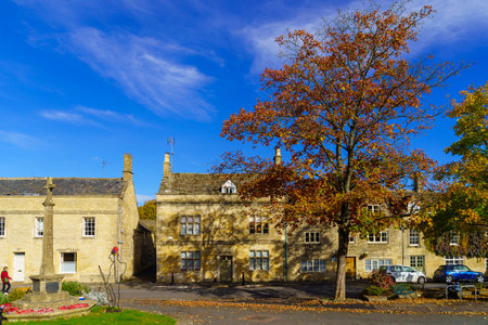 Northleach, UK - October 17, 2022: View of typical houses, with visitors, in Northleach, the Cotswolds region, England, UKのeditorial素材