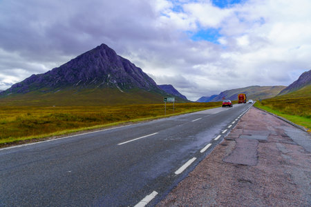 Glencoe, UK - September 28, 2022: View of the landscape of Glen Etive valley, with road and traffic, in the West Highlands of Scotland, UKのeditorial素材