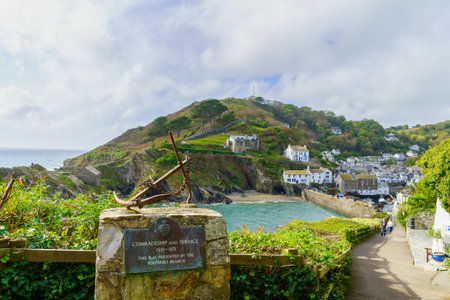 Polperro, UK - October 16, 2022: View of monument to lost sailors, in the fishing village Polperro, Cornwall, England, UKのeditorial素材