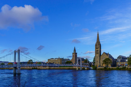 Inverness, UK - October 05, 2022: View of the Greig Street Bridge, over the Ness River, and churches, in Inverness, Scotland, UKのeditorial素材