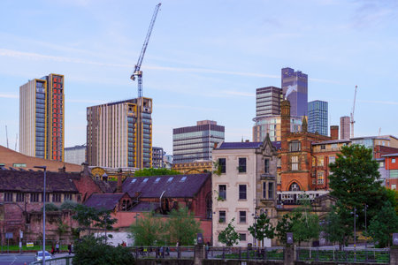 Manchester UK - October 08, 2022: Skyline view in central Manchester, with locals, and visitors, in...