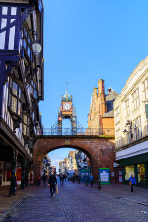 Chester, UK - October 10, 2022: View of the Eastgate, Eastgate Clock and the Rows historic street, with locals and visitors, in Chester, Cheshire, England, UKのeditorial素材